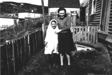 035: Mollie McCarthy and Marie Ryan in her First Communion dress. (circa 1942)  - Mollie daughter of James McCarthy &amp;amp; Julia Reddy; Marie daughter of Joseph Ryan &amp;amp; Ursula  Barry.